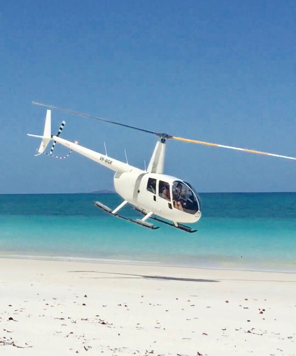 Soar high above the clouds and see the great barrier reef and whitsunday islands in a whole new light! Heli Trip To Whithaven Beach In The Whitsundays